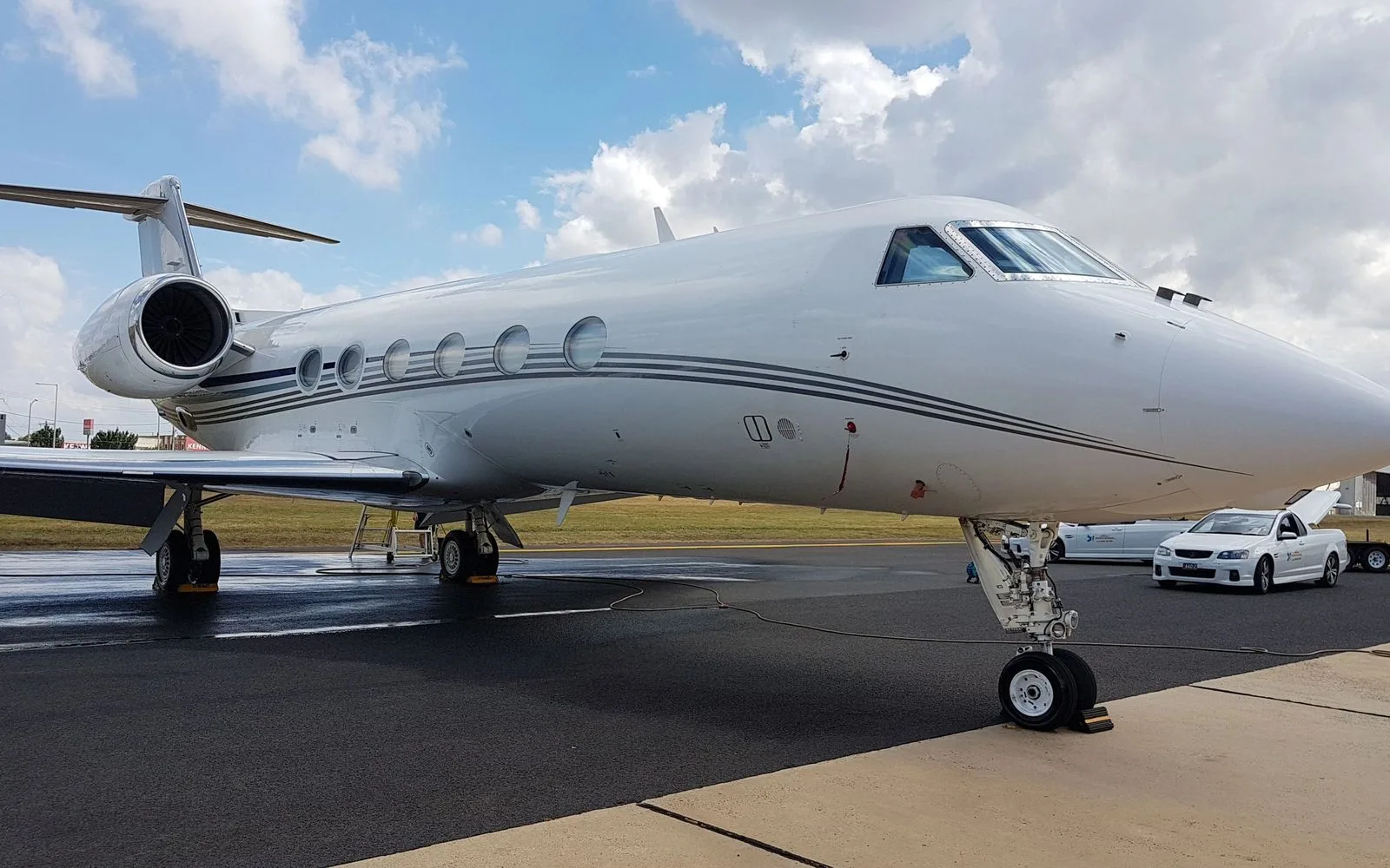Gulfstream business jet on a freshly washed ramp after exterior detailing by Jet Refined at PDK