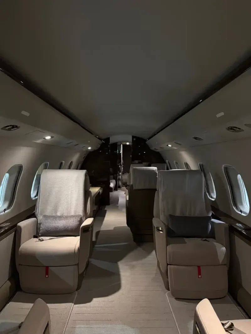 Light jet cabin with cream leather executive seating