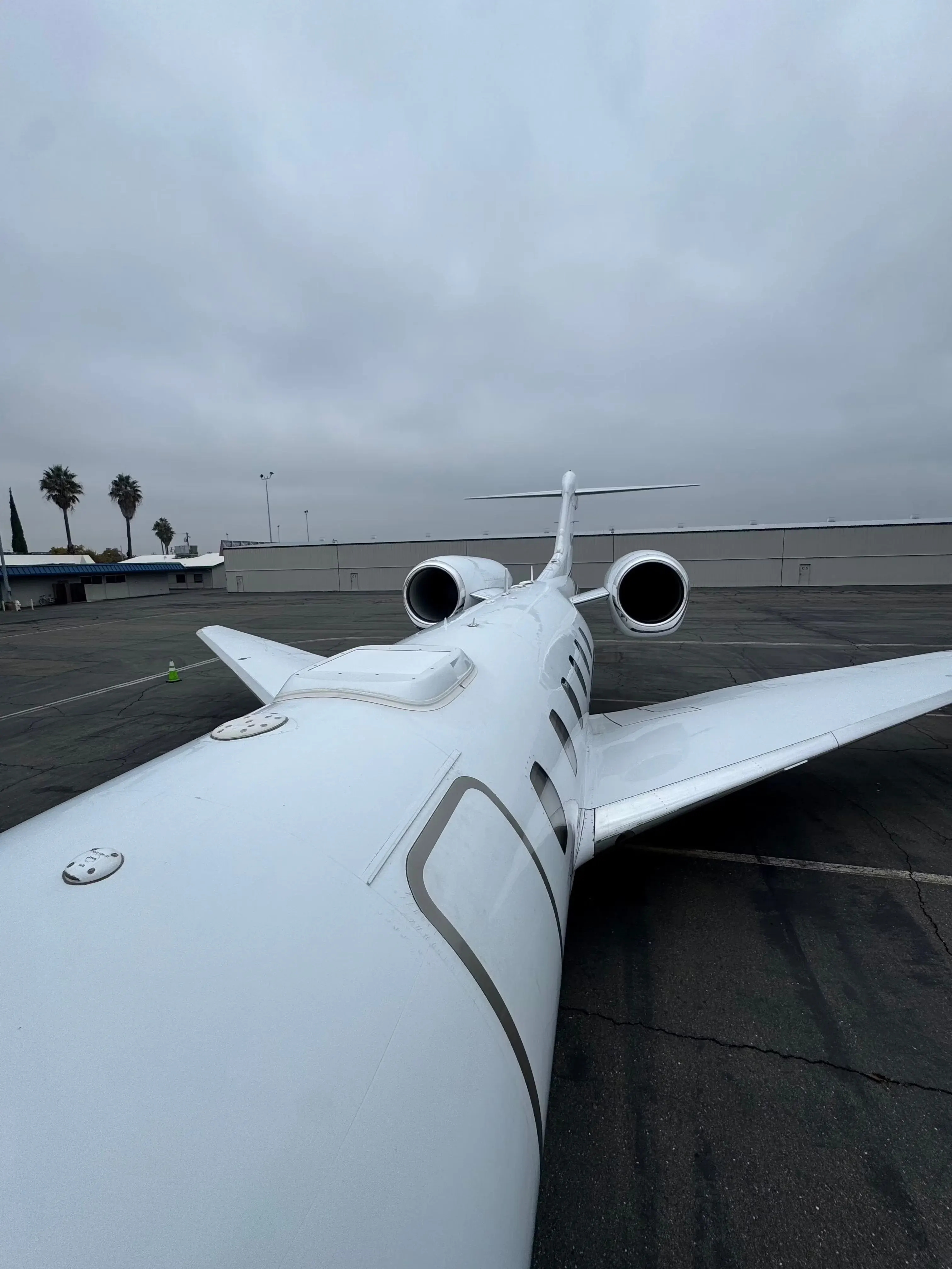 Close detail of a large-cabin jet tail and winglet after washing