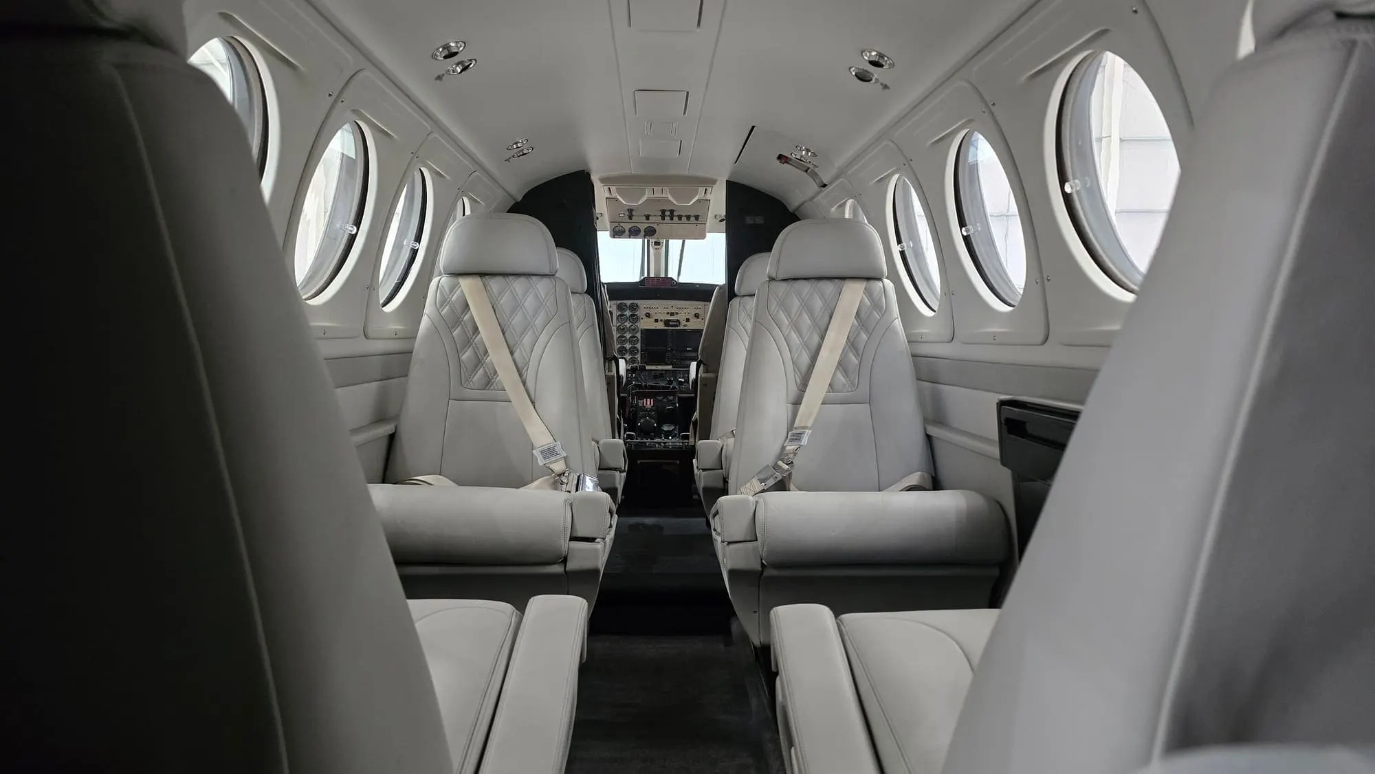 King Air cabin interior in white leather with cleaned window surrounds