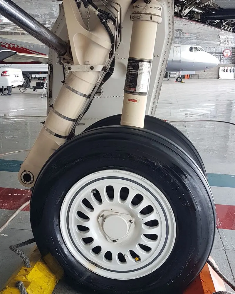 Close view of a cleaned main gear wheel and brake assembly